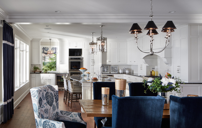 Dining room Chairs. The host chairs fabric is Designers Guild. dining-room #diningroom #chairs #fabric #Designersguild Vivid Interior Design. Hendel Homes