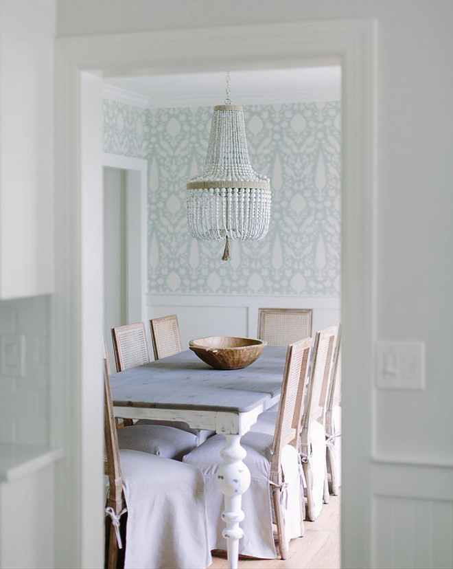 Coastal Farmhouse Dining Room. Coastal Farmhouse Dining Room. Coastal Farmhouse Dining Room with wallpaper and white beaded chandelier. #CoastalFarmhouse #DiningRoom farmhouse-dining-room-kate-marker-interiors