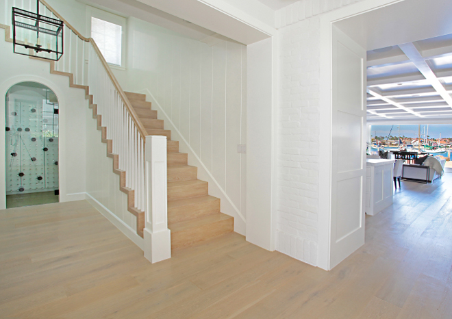 Paneled Staircase Wall Details: 16” on center with ¼ “ reveal between boards running vertically. Winkle Custom Homes. Melissa Morgan Design. Ryan Garvin Photography