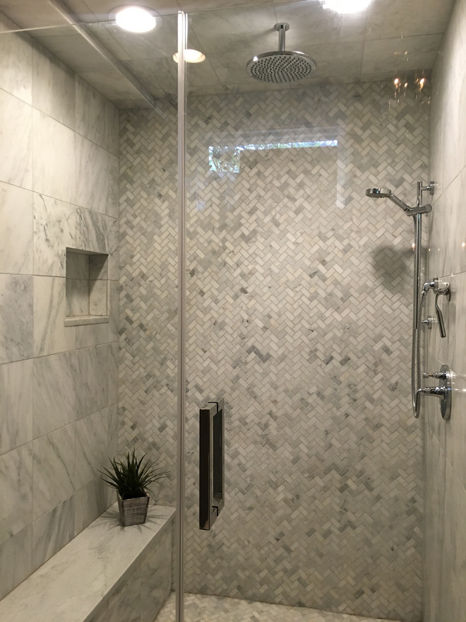 Herringbone shower tile. Shower Tiles: Honed Carrara Marble 12” X 12” and Mosaic is 1” X 2” honed Arabescato herringbone. #shower #tile #herringbone #minitile Beautiful Homes of Instagram Sumhouse_Sumwear