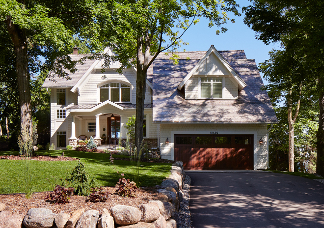 Lke home. Lake home exterior. Lake homes are truly a favorite of mine... I love the peacefulness you often find in properties like this one. Notice the mature trees... everything looks so quiet and calm.Can you hear the birds? #lakehome #lakehomes #lake #home home-exterior Vivid Interior Design. Hendel Homes