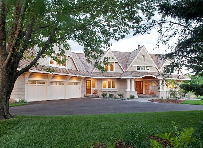 Built by Hendel Homes and with inspiring interiors by Danielle Loven from Vivid Interior Design, this classic east-coast shingle-style home brings Hamptons style to the Midwest. The home emulates coastal English elegance with warm, inviting furnishings and finishes that juxtapose refined and natural for a truly rich contrast. The interiors incorporate fresh updates to historical and traditional references and draw in the romantic, expansive lake views beyond. Save, pin and take notes on all of the sources shared by the designers on Home Bunch. home-exterior Vivid Interior Design. Hendel Homes