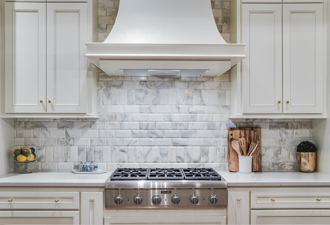 Kitchen backsplash. The backsplash is Calacatta gold beveled edge subway tile. Notice how teh tile is set. #backsplash #tile #Calacattagold #bevelededge #subwaytile kitchen-backsplash Ivy House Interiors