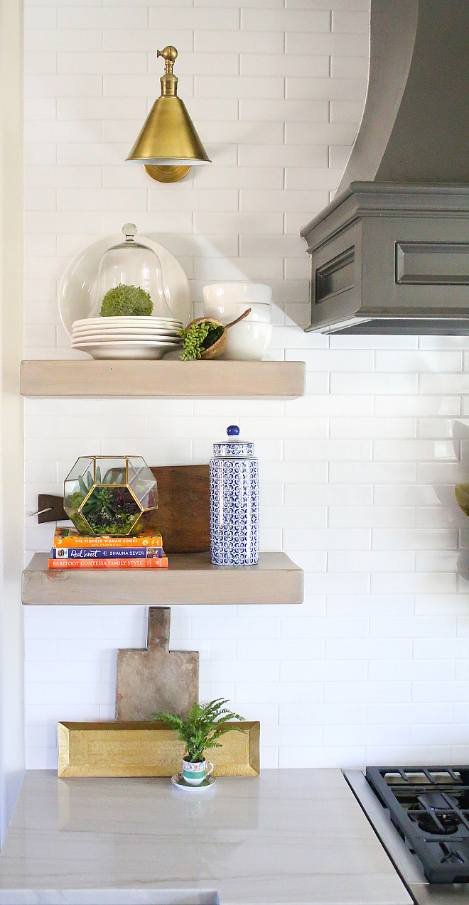 Library Sconces Above Shelving: Visual Comfort Boston Library light in Antiqued brass. kitchen-floating-shelves Home Bunch's Beautiful Homes of Instagram curlsandcashmere