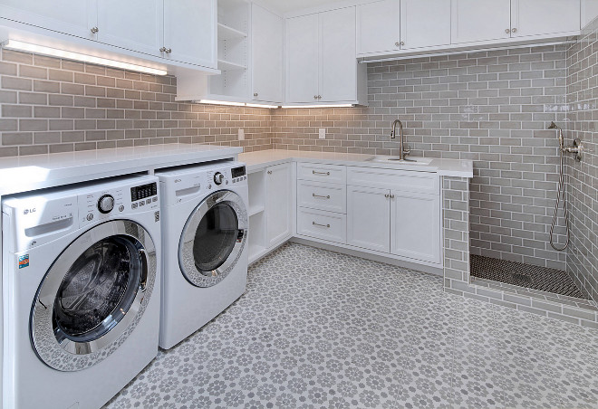 Laundry room pet shower ideas. Laundry room features cement floor tile, grey wall and backsplash time and a pet shower. Laundry room pet shower. laundry-room-pet-shower #laundryroom #petshower #cementtile #greytile Brandon Architects, Inc. Jeri Koegel Photography