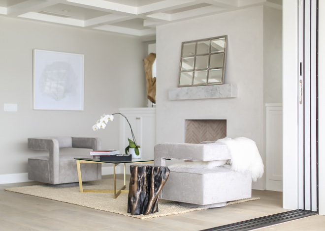 Bedroom sitting are furniture. Master bedroom lounge chairs and swivel and custom designed and fabricated by the deisgner in a light gray velvet fabric. Coffee table and side table are from "Restoration Hardware Modern". Winkle Custom Homes. Melissa Morgan Design. Ryan Garvin Photography