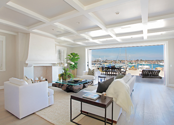 Living room coffered ceiling and sliding patio doors. Winkle Custom Homes. Melissa Morgan Design. Ryan Garvin Photography