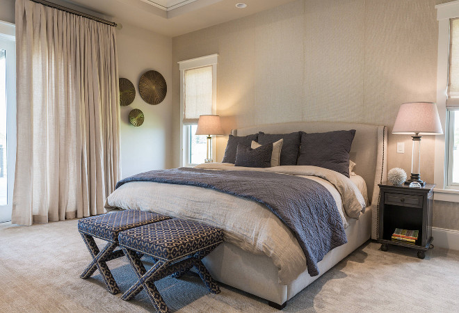 Master Bedroom. The interior designer went for an elegant but relaxed vibe in this master bedroom with linen bedding from Restoration Hardware and custom linen drapery. Upholstered x-benches are by Lee Industries. #masterbedroom #bedroom master-bedroom Restyle Design, LLC.