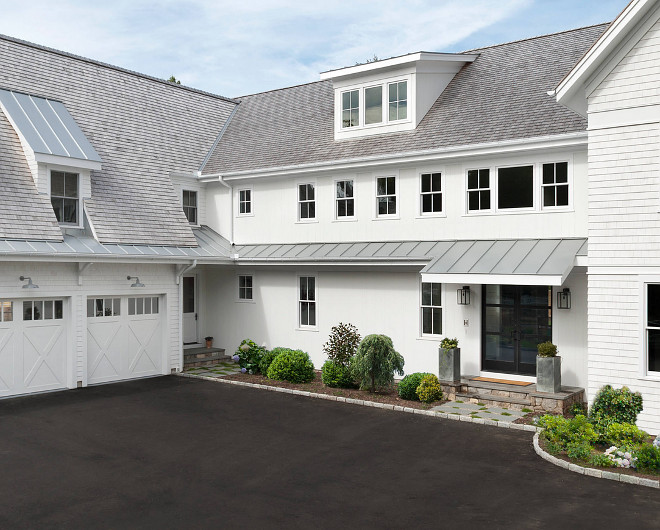 Modern farmhouse exterior with commercial grade aluminum and glass double doors. Front door is commercial grade aluminum and glass double doors. #ModernFarmhouse #ModernFarmhouseexterior #commercialgrade #aluminumandglassdoor #doubledoors modern-farmhouse-exterior Bluewater Home Builders