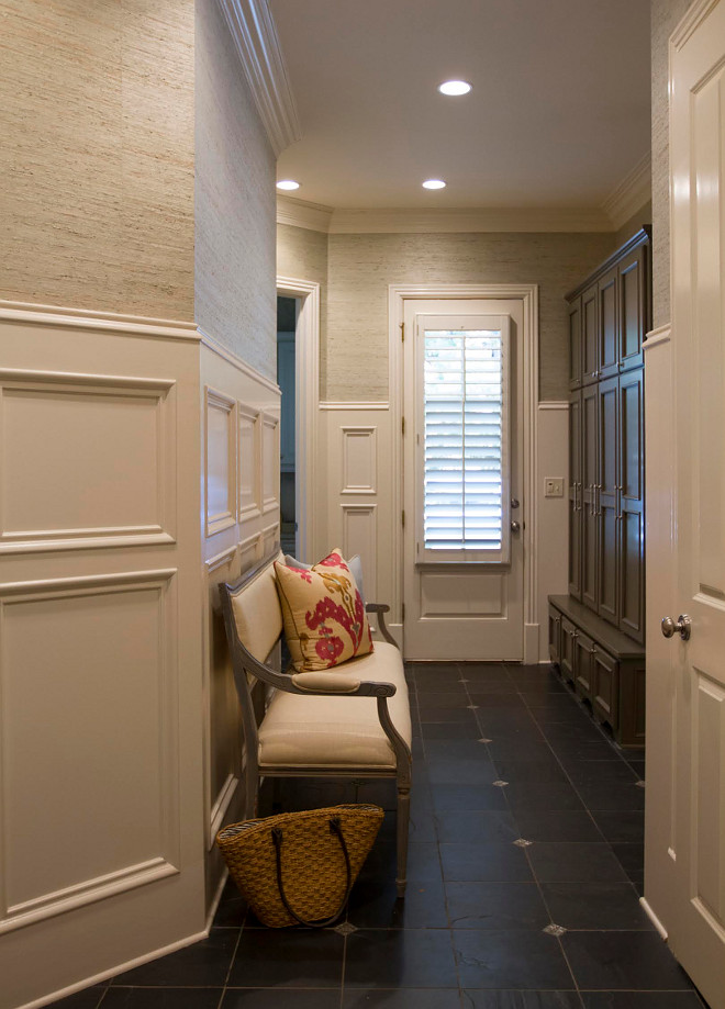 Mudroom Raffia Wallpaper above wainscotting closed cabinets and slate floor tile