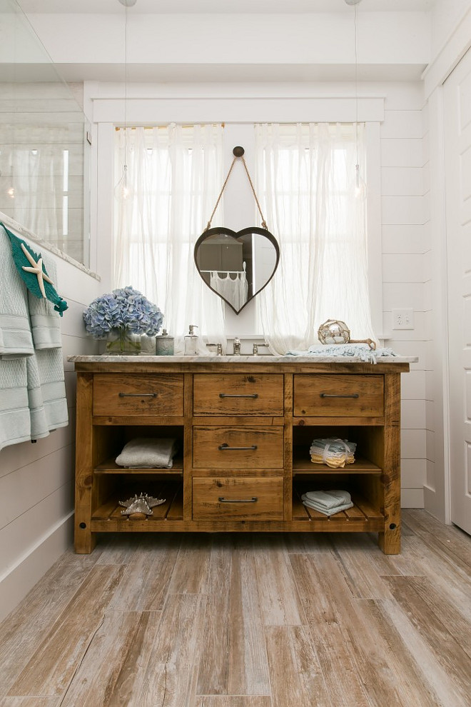 Plank Wood Tile. Bathroom with Plank Wood Tile, Shiplap Walls and Reclaimed Wood Vanity. Bathroom with Plank Wood Tile. Bathroom Shiplap Walls. Bathroom Reclaimed Wood Vanity #Bathroom #PlankWoodTile #Woodtile #ShiplapWalls #ReclaimedWoodVanity Coralberry Cottage