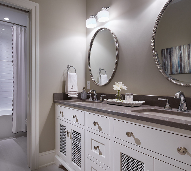 Benjamin Moore HC 172 Revere Pewter Bathroom. Bathroom paint color is Benjamin Moore HC 172 Revere Pewter. Cabinet is BM White Dove. revere-pewter-hc-172-benjamin-moore-bathroom #bathroom #paintcolor #BenjaminMooreHC172ReverePewter Vivid Interior Design. Hendel Homes