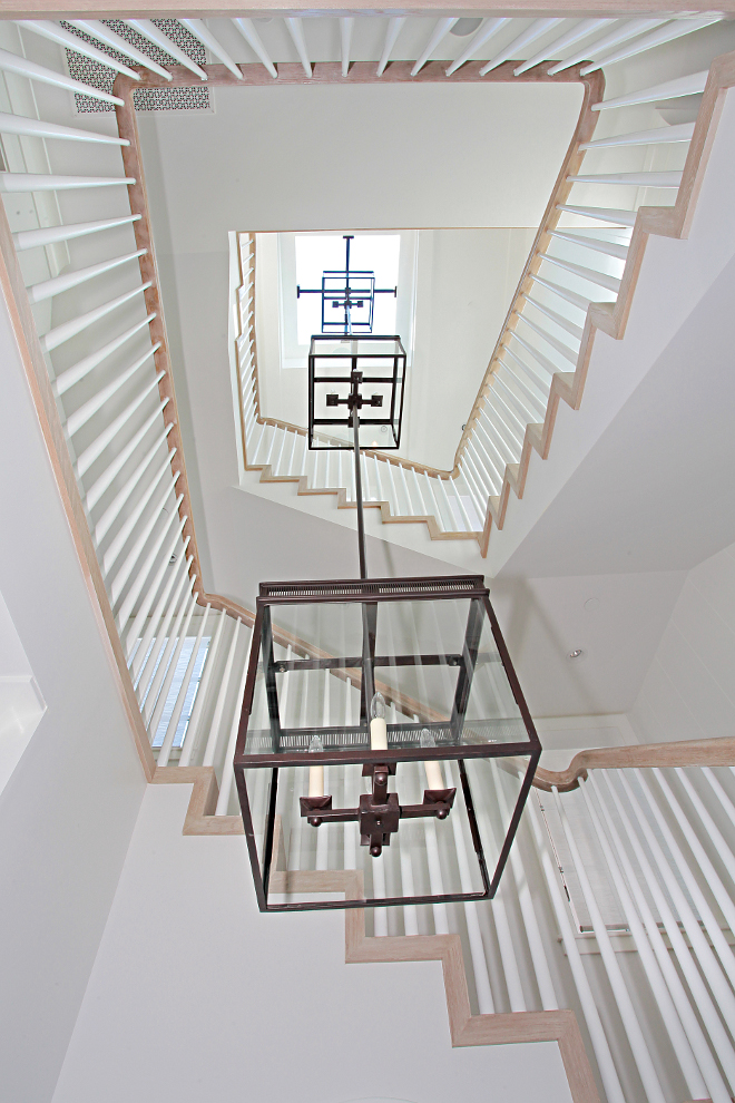 Staircase Lighting. Lighting is custom by Dana Creath. #staircase #lighting #staircaselighting Winkle Custom Homes. Melissa Morgan Design. Ryan Garvin Photography