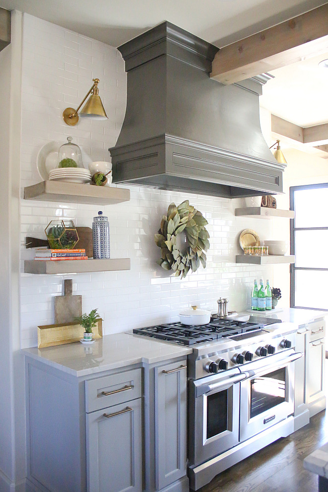 Two toned kitchen paint color. Grey two toned kitchen. The kitchen hood is painted in Sherwin Williams Urbane Bronze and the lower cabinets are Sherwin Williams Dorian Grey. two-toned-kitchen-two-toned-grey-kitchen #twotonedkitchen #paintcolorHome Bunch's Beautiful Homes of Instagram curlsandcashmere