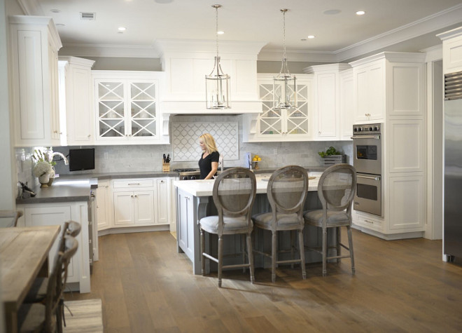 White kitchen with white oak floor. White kitchen with grey island and white oak flooring. Popular kitchen design look, white cabinets, grey island and white oak floos. #Whitekitchen #greyisland #whiteoakfloor #kitchenwhiteoakfloor #whiteoakflooring white-kitchen-with-white-oak-floor Eye for the Pretty.