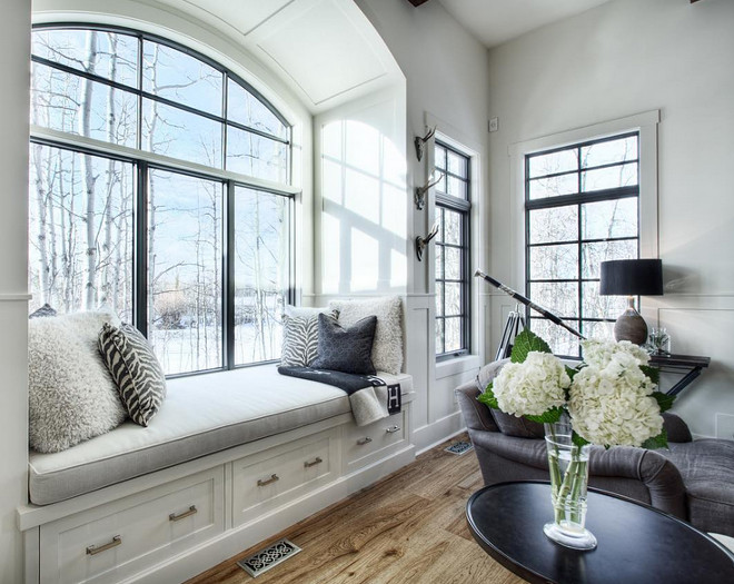 Living room window seat. Farmhouse living room Living room window seat. Living room window seat #Livingroom #windowseat window-seat-arched-window-seat Verandainterior via Instagram.