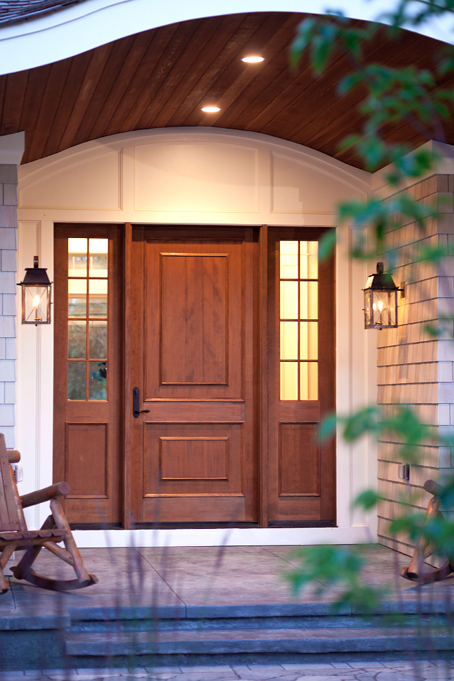 Wood front door and wood tongue and groove porch ceiling. Gorgeous custom wood front door. Notice the tongue and groove porch ceiling. wood-front-door-and-wood-tongue-and-groove-porch-ceiling #porch #wooddoor #frontdoor #woodfrontdoor #tongueandgroove #porchceiling Vivid Interior Design. Hendel Homes