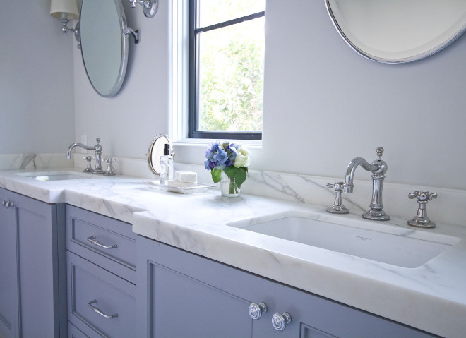 The vanity countertop is Calacatta marble, honed. The vanity countertop is Calacatta marble, honed. Blue gray batheoom cabinet with calacatta marble countertop. #Calacattamarblecountertop #countertop #bathroom bathroom-marble-vanity Home Bunch Beautiful Homes of Instagram Bryan Shap @realbryansharp