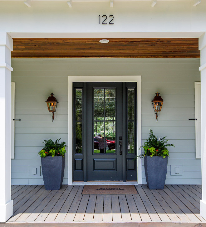 Sherwin Williams Tricorn Black. Exterior Paint Color: Main body is Sherwin Williams SW7058 Magnetic Gray. The trim color is Sherwin Williams SW7008 Alabaster. Black door painted in Sherwin Williams Tricorn Black. Sherwin Williams Tricorn Black #SherwinWilliamsTricornBlack #blackdoor #paintcolor black-door-paint-color-sherwin-williams-tricorn-black Cottage Home Company