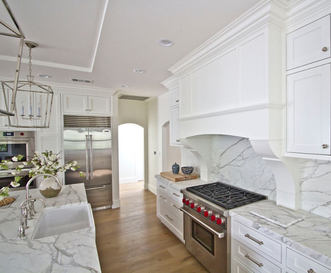 The counter and backsplash material are Calacatta Marble, honed. Kitchen featuring calacatta marble on countertops and calacatta marble slab countertop #Calacatta #marble #countertop #slab #backsplash Home Bunch Beautiful Homes of Instagram Bryan Shap @realbryansharp