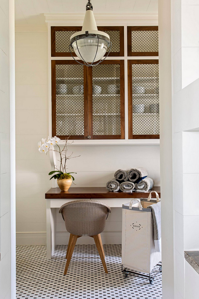 Butlers pantry. The barn door opens to a gorgeous butler's pantry with walnut wood countertop and walnut cabinet doors. #butlerspantry #walnut #countertop #walnutcountertop #walnutecabinet #cabinetdoor Herlong & Associates Architects + Interiors