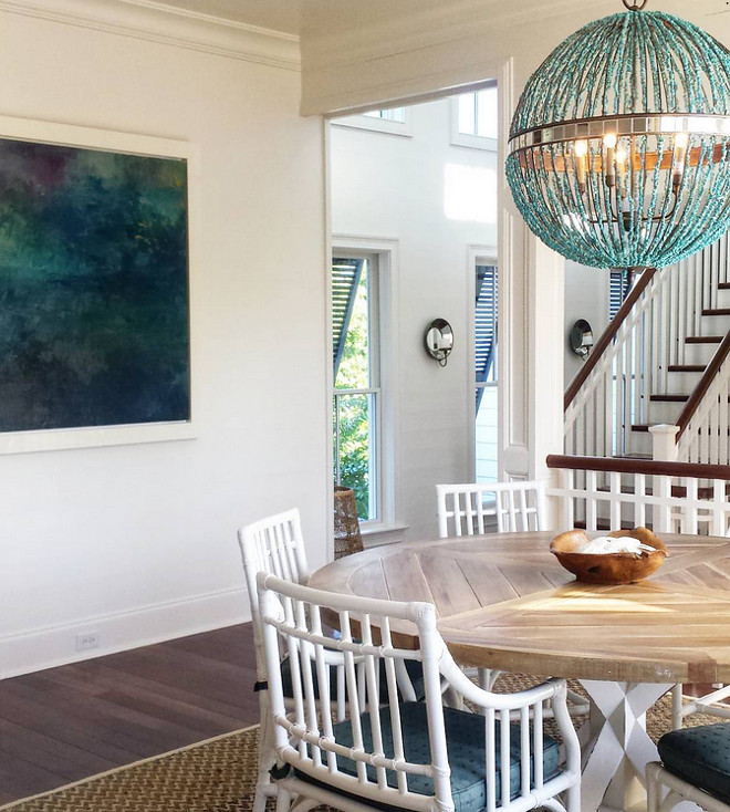 Dining room turquoise chandelier. Chandelier is Alberto Orb Chandelier from Currey & Co. #turquoisechandelier #turquoise #chandelier #diningroom Image: @kialynea via Instagram