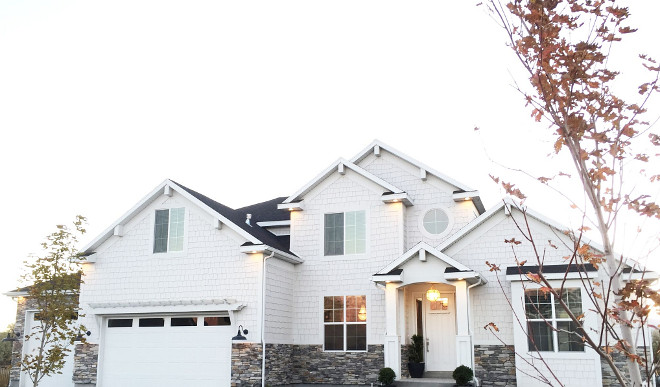 Light grey shingle home with grey stone. Paint color and stone source are listed on the blog. Home Bunch's Beautiful Homes of Instagram janscarpino