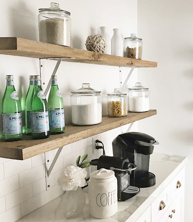 Farmhouse kitchen with barn wood shelves. The shelves are actual barn wood. farmhouse-kitchen-pantry #barnwood #shelves #woodshelves #farmhouse #farmhousekitchen #shelves #barn #wood Beautiful Homes of Instagram @nc_homedesign via Home Bunch