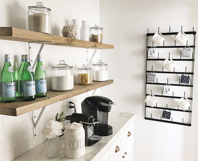 Famrhouse pantry. Famrhouse kitchen pantry with reclaimed barn wood shelves and coffee station. farmhouse-kitchen-pantry-with-reclaimed-barn-wood-shelves #farmhouse #farmhousepantry #farmhousekitchenpantry #farmhousepantryideas #reclaimedwood #relaimedshelves #barnwood #reclaimedwoodshelves #openshelves #barnwoodshelves Beautiful Homes of Instagram @nc_homedesign via Home Bunch