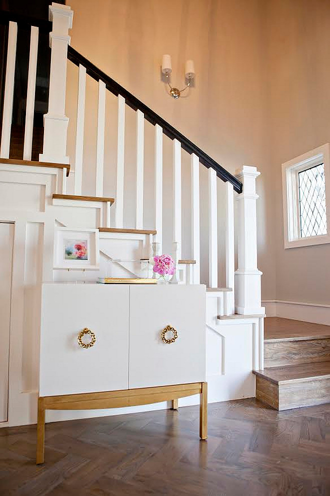 Small foyer ideas. There isn't a lot of space in this foyer, so the designer wanted to keep everything minimal. They found the entry furniture piece locally and added some antique pieces that the clients had along with some finds from Home Goods. #smallfoyer #smallinteriors #foyer foyer-furniture Ivy House Interiors
