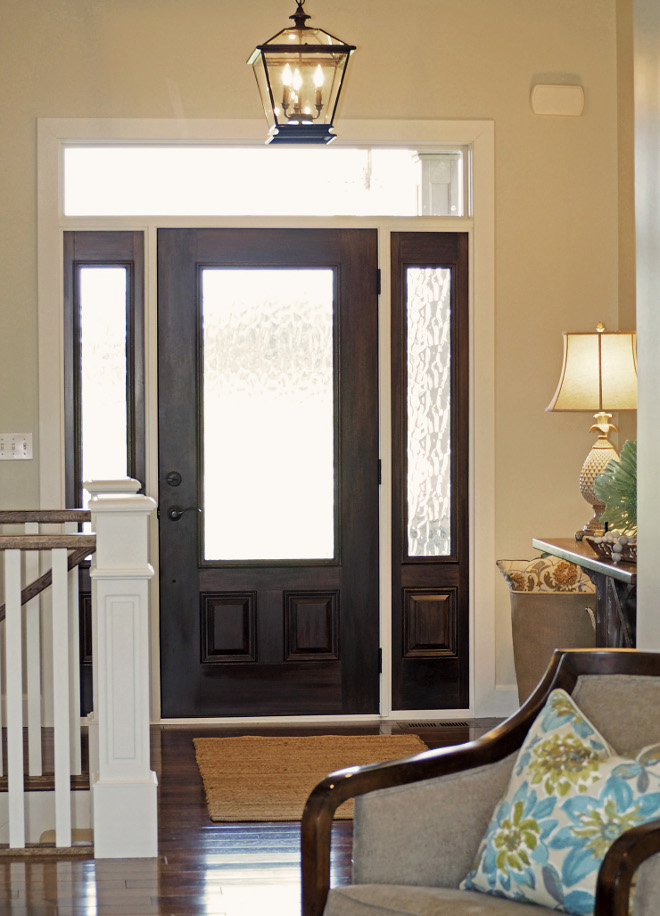 Foyer. Foyer lighting and rug. Foyer Lighting. Foyer Rug. The welcoming foyer features a lantern light fixture with black iron finish. Rug is Pottery Barn – Heathered Chenille Jute/natural. #foyer #foyerlighting #lighting #foyerrug #rug Home Bunch Beautiful Homes of Instagram wowilovethat