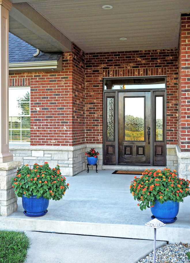 Stained Wood Front Door. Front door, sidelights and transom are Pella Window & Door Company – Glass is obscure on door and sidelights. Can lights were used for exterior entryway lighting and they were also installed in the soffits on the front of the house for added illumination at night. #Frontdoor #door Home Bunch Beautiful Homes of Instagram wowilovethat