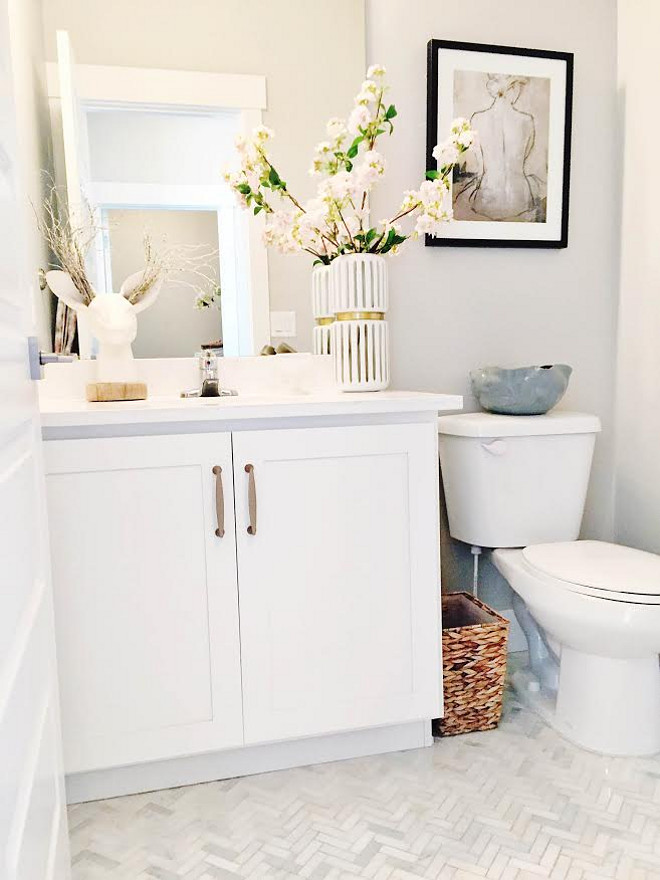 Herringbone Tile. Bathroom Herringbone Tile. Herringbone Tile. The half-bath floors are Herringbone Marble Winter Sky Allen and Roth with white grout. #bathroomHerringboneTile #HerringboneTile herringbone-tile Home Bunch's Beautiful Homes of Instagram janscarpino