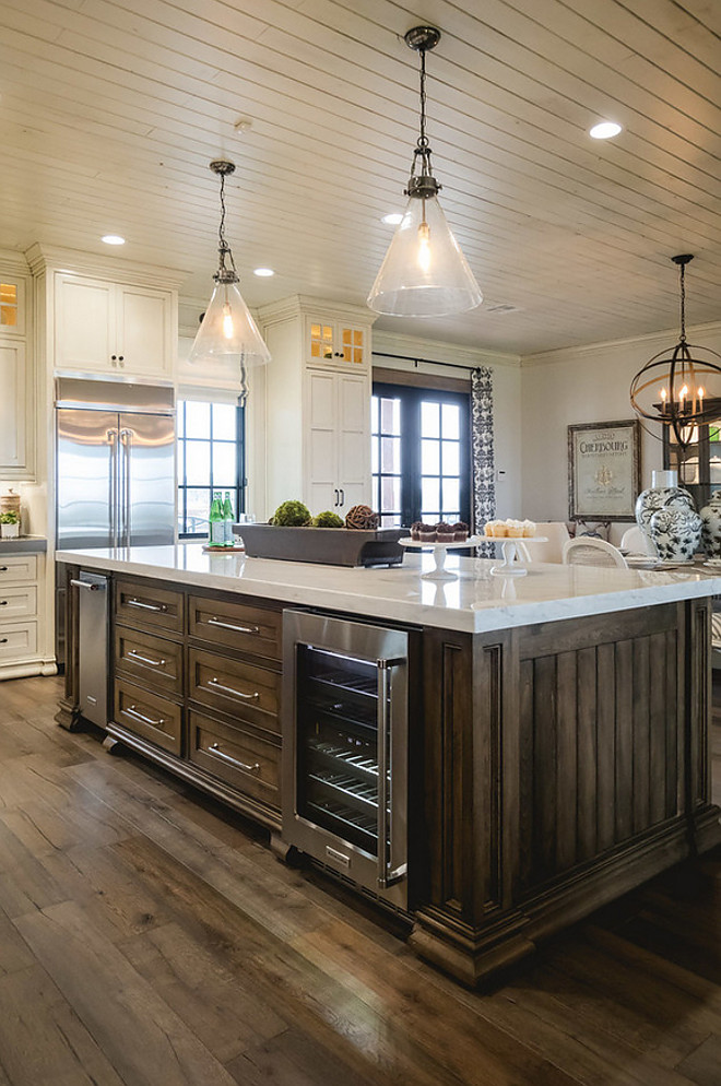 Island Stain Color. Kitchen island and hood features a tobacco stain. The islands and hood were stained in Tobacco and glazed with VanDyke brown glaze. #IslandStainColor island-stain-color #Tabaccostaincolor Alicia Zupan