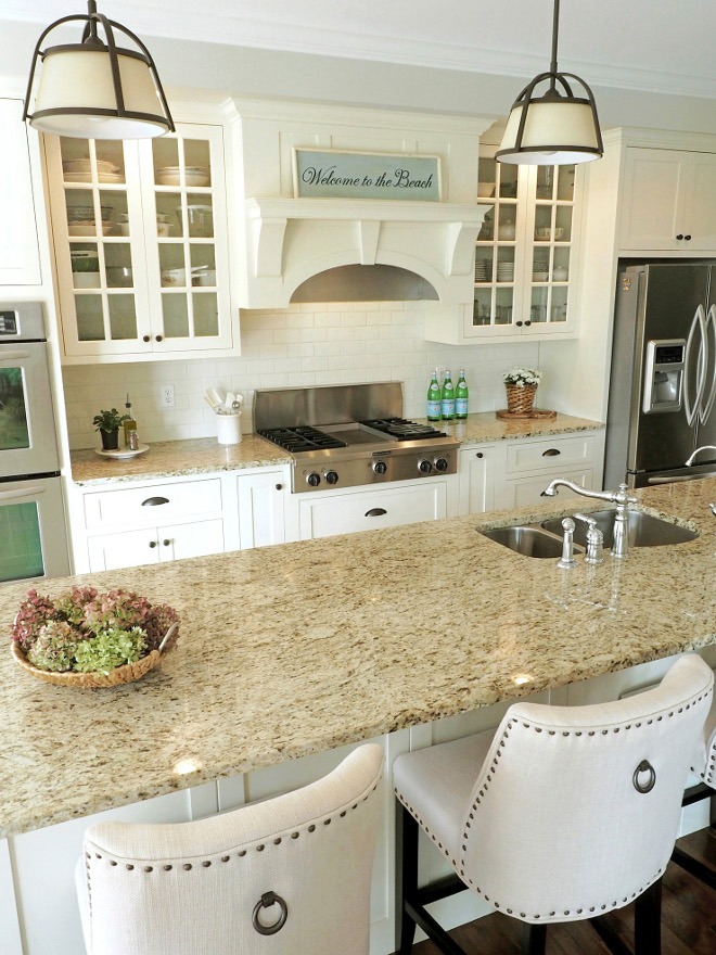 Ivory Kitchen with Maple cabinets. Our cabinets are from Shiloh Cabinetry and the color is Ivory. The Sherwin Williams paint color closely matching is Dover White #SW6385. The doors and drawers are inset with hidden hinges. The door and drawer style is a recessed panel/shaker. All of our cabinets are painted Maple Wood cabinets. Bar stools are from Pier 1 Imports. #kitchen #maplecabinet #ivorykitchen #ivorykitchencabinet Home Bunch Beautiful Homes of Instagram wowilovethat