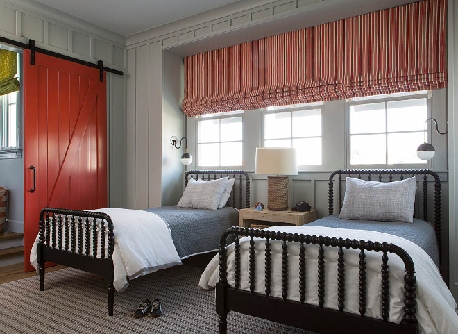 Bedroom with red barn door to bathroom. Bedroom features grey board and batten paneling and a red barn door to bathroom. #bedroom #barndoor #redbarndoor #boardandbatten #paneling Matt Morris Development