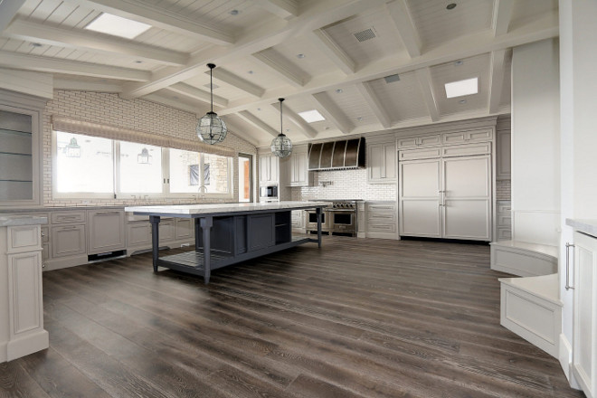 Blue grey kitchen island with siding cabinet doors and breakfast nook with circular built-in banquette. Freestanding Blue grey Kitchen Island with Sliding Cabinet Doors. Kitchen Freestanding Blue Grey Kitchen Island with Sliding Cabinet Doors. Large kitchen with Freestanding Blue Kitchen Island with Sliding Cabinet Doors #kitchen #Freestandingisland #Bluegreyisland #blueisland #greyisland #KitchenIsland #SlidingCabinetDoors #circularbanquette Matt Morris Development