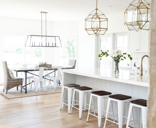 Long kitchen island. 12 ft long kitchen island. This is my favorite room in the whole house! One feature I really wanted was a long kitchen island! Ours is 12 ft, and it’s the perfect size for my family if we decide to eat there instead of our dining table, for all of kids when my twin sister come over for playdates, and my immediate family during holidays. #12ftisland #12ftkitchenisland #longkitchenisland Beautiful Homes of Instagram @nc_homedesign via Home Bunch