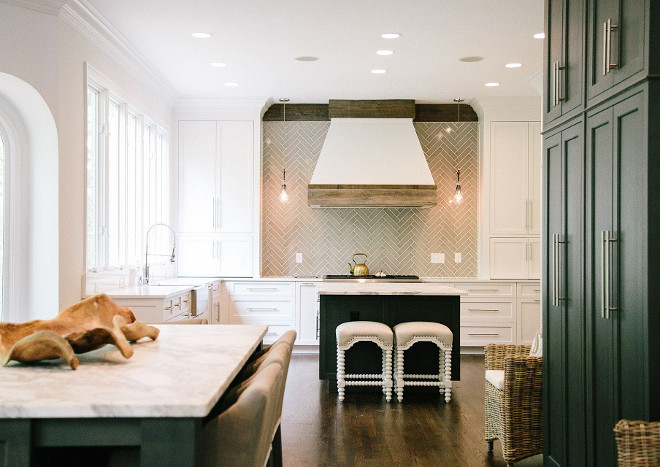 Transitional white kitchen. The cabinets are White Oak, and the Kitchen Island is a Custom Stain Color. #Transitional #whitekitchen #Transitionalwhitekitchen transitional-kitchen Outrageous Interiors