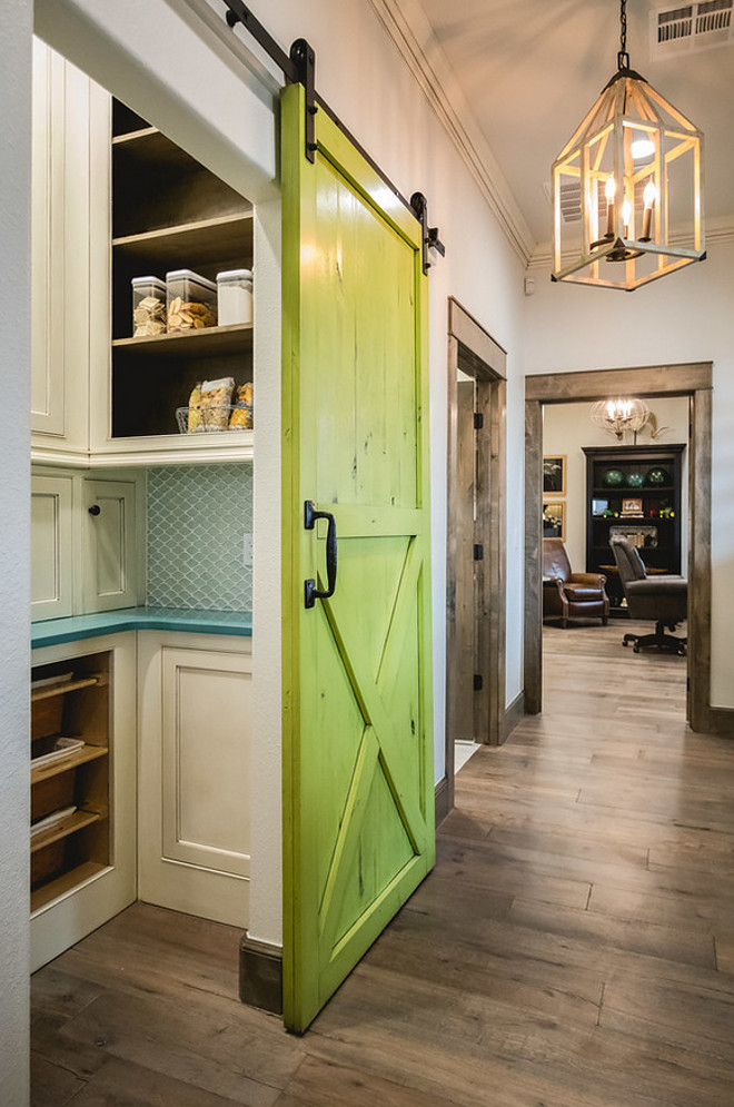 Benjamin Moore Douglas Fir. Painted Barn Door. This green barn door paint color is Benjamin Moore Douglas Fir with a charcoal oil base glaze. Butler's pantry with painted barn door. Painted Barn Door in a vibrant green color. Painted Barn Door. Painted Barn Door #PaintedBarnDoor #BarnDoor #BenjaminMooreDouglasFir Alicia Zupan