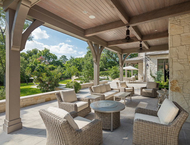 Patio. The stone flooring was selected by Alamo Stone in Houston. The ceiling was 1x6 pine stained in a custom color. Same for the columns, custom mixed stain. Allan Edwards Builder Inc 