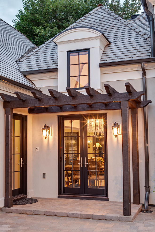 Exterior Lighting and pergola. Exterior lighting is from Hinkley Lighting, Inc. #Exteriorlighting #pergola 3exteriors #homeexterior Hendel Homes