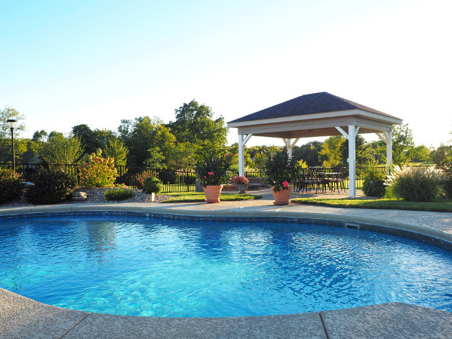 Pool. Pool. Vinyl liner pool – 18x36, irregular shape with a built-in seat inside the pool and deck jets that create fountains into the pool. #pool Home Bunch Beautiful Homes of Instagram wowilovethat