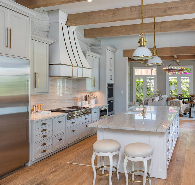 White Macaubas quartzite. Slabs of White Macaubas quartzite was used on countertops and as backsplash in this kitchen. white-macaubas-marble-countertop White Macaubas quartzite #WhiteMacaubas #quartzite #WhiteMacaubasquartzite Allan Edwards Builder Inc