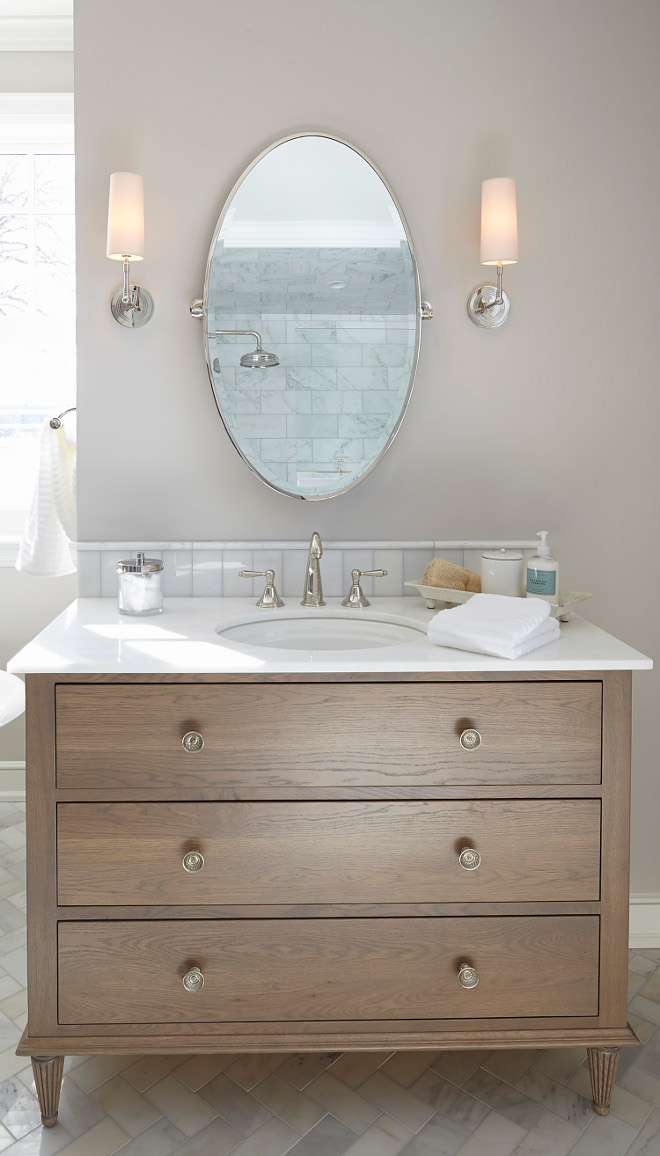 White oak stain bathroom vanity. Vanity was custom designed and built. The wood type is White Oak with a light gray brown stain. White oak stain bathroom vanity #Whiteoak #Whiteoakstain #Whiteoakbathroom #Whiteoakbathroomvanity vanity white-oak-stain-bathroom-vanity Hendel Homes