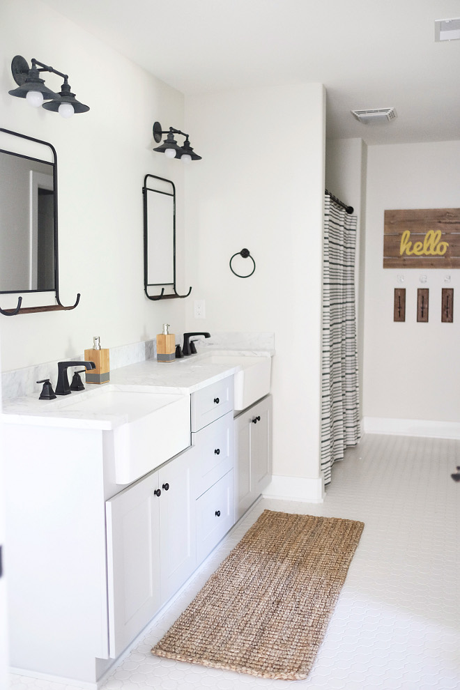 Farmhouse Kids Bathroom. Farmhouse Kids Bathroom Painted in Benjamin Moore Classic Gray. #FarmhouseKidsBathroom #FarmhouseBathroom #KidsBathroom #BenjaminMooreClassicGray Beautiful Homes of Instagram @nc_homedesign via Home Bunch