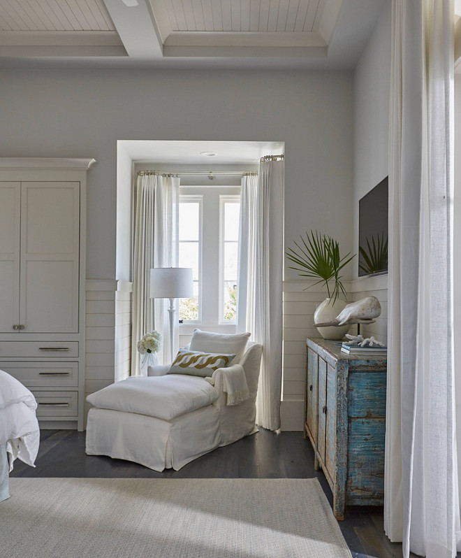 Bedroom Reading Corner. Bedroom nook reading corner. Inviting reading corner nook with white chaise lounge. Windows are dressed in white cotton curtains. #bedroom #readingcorner #bedroomnook bedroom-nook