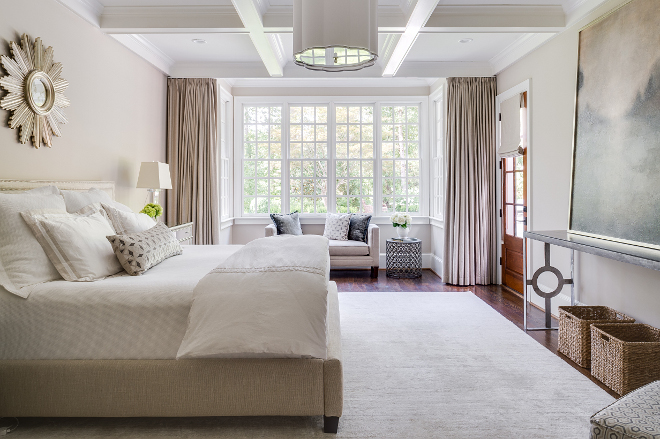 Master bedroom. Relaxing master bedroom color palette. The homeowners wanted a tranquil master bedroom where they could totally relax. The designer chose a palette of warm grays and beiges to keep everything clam and tranquil. #Relaxingmasterbedroom #bedroom #colorpalette Interiors by Courtney Dickey. Architecture by T.S. Adam Studio.