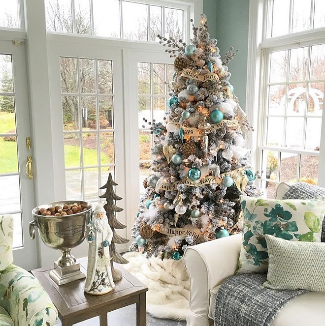 Benjamin Moore Catalina Blue. Wall paint color is Benjamin Moore Catalina Blue. When the Tree Decor Matches the Wall Color #BenjaminMooreCatalinaBlue Susan Lynn via Instagram @stylebysusanlynn.