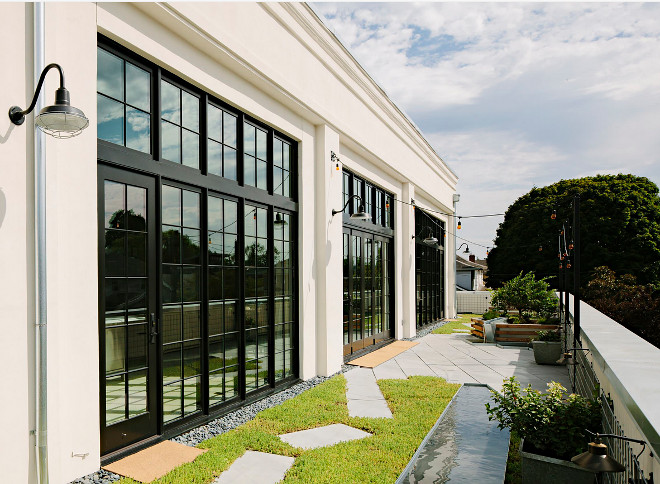 Black steel windows and doors. Walls of black steel doors and windows with transoms. Black steel windows and doors #Blacksteelwindows ##Blacksteeldoors black-steel-windows-and-doors-emerick-architects Emerick Architects